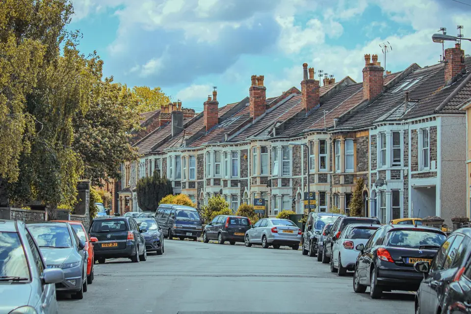 A street of brick terraced houses in England
